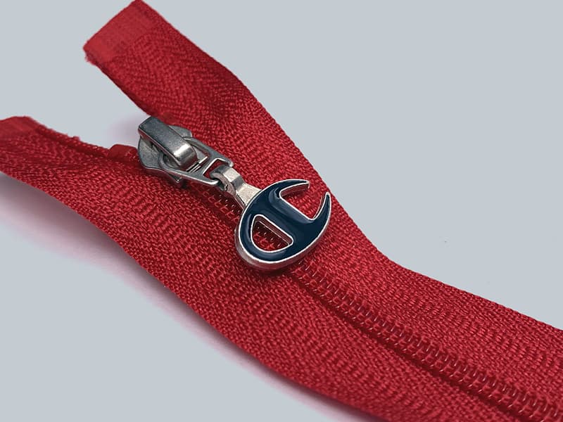 Custom zipper pulls for clothing.