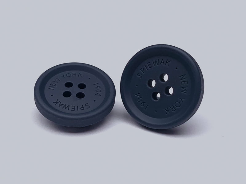 Sew-on buttons for outerwear branding.