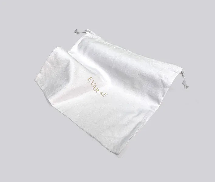 Evarae white cotton branded dust bag.