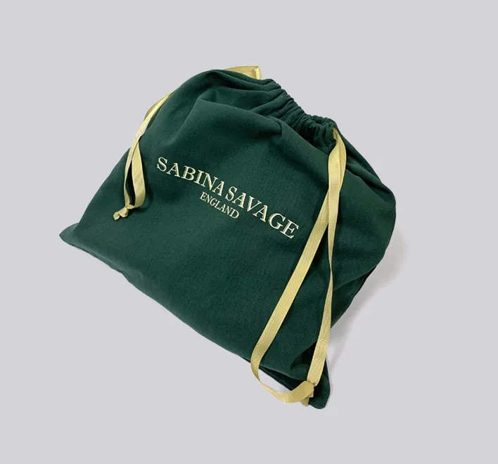 Sabina Savage cotton dust bag printed logo.