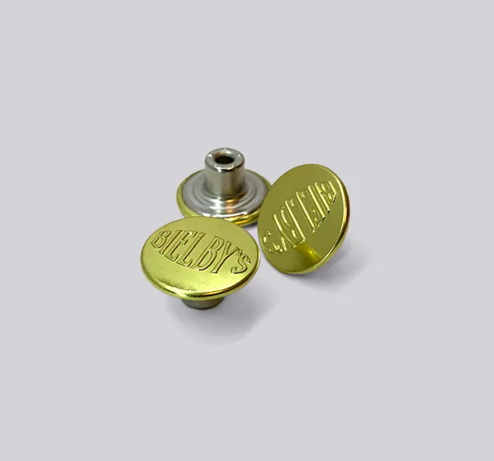 Embossed logo brass cap jeans button.