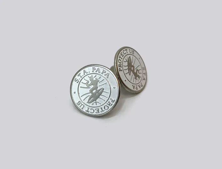 Enamel fill brass cap embossed jeans button.