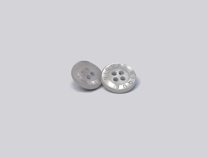 Shell 4-hole sew-on button.