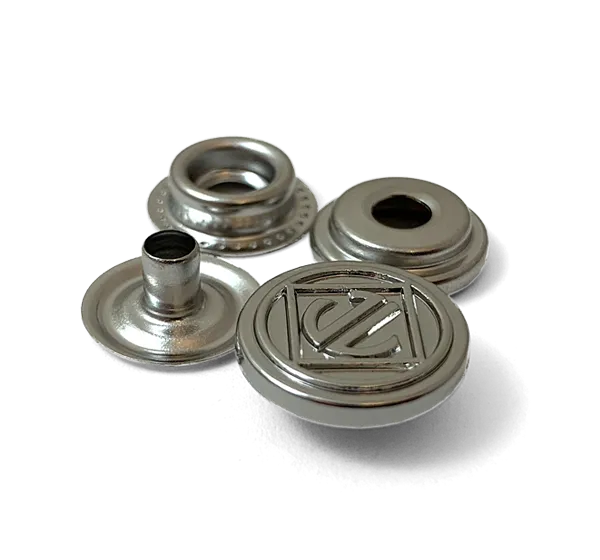 Custom snap fasteners for apparel.