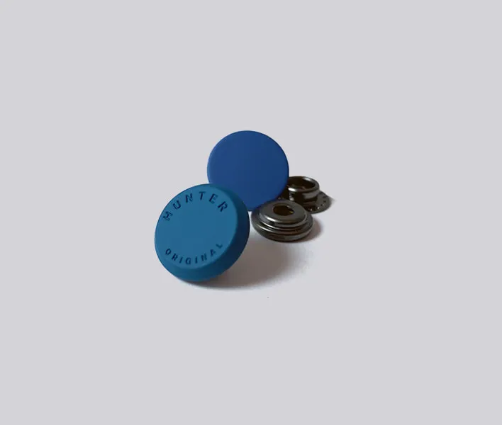 Rubber coated snap fastener set.