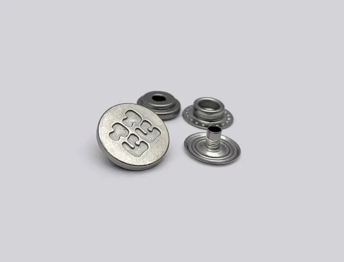 Custom logo press fastener set.