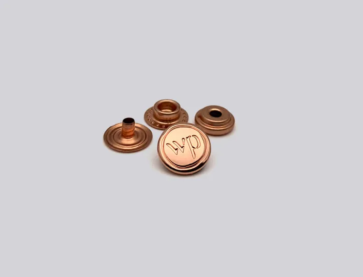 Brass cap s-spring snap fastener set.