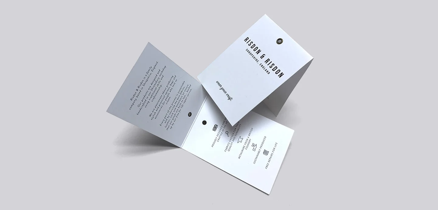 Printed booklet swing tag for clothing.