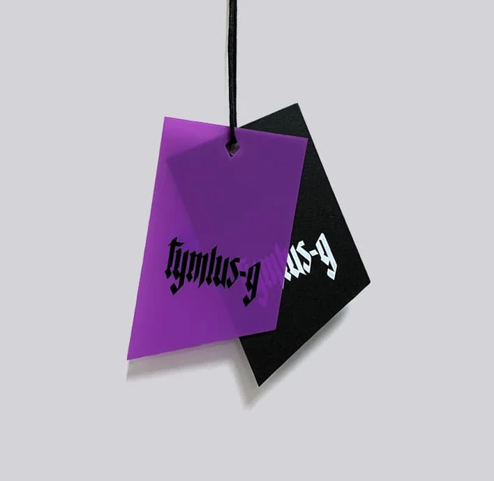 Plastic and paper swing tag for apparel.