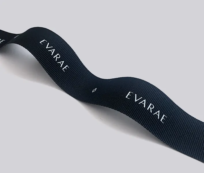 Grosgrain ribbon with printed logo.