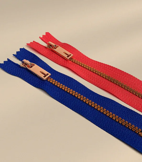 Complete zippers with branded zipper pull.